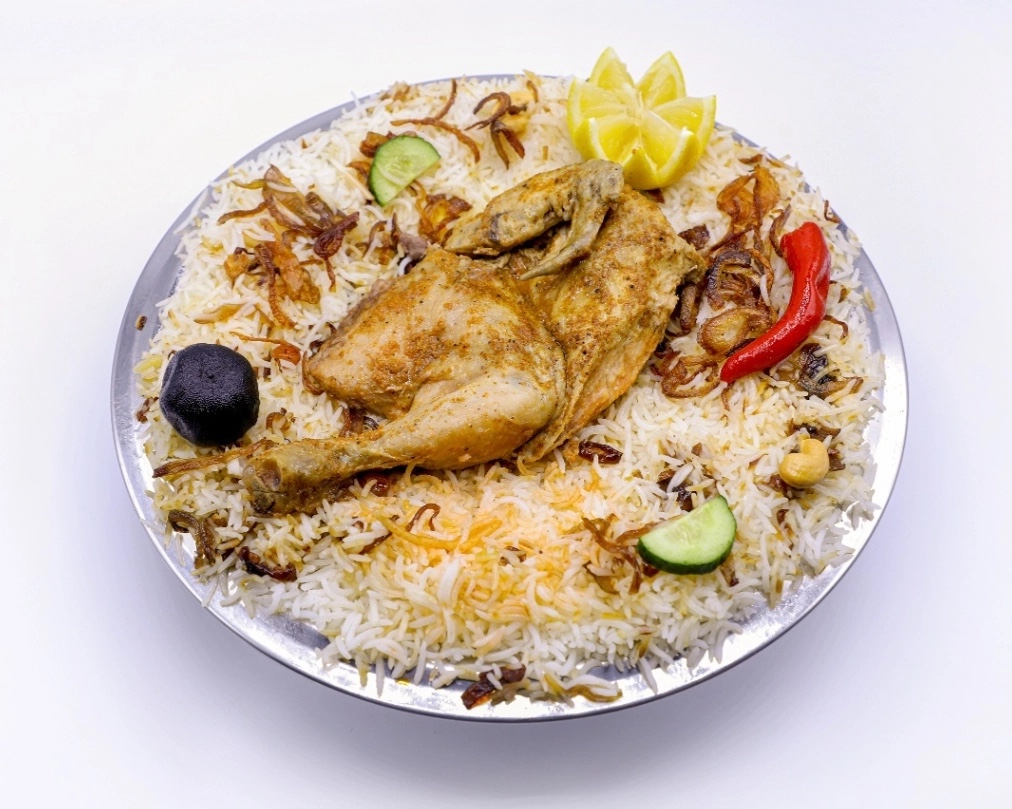 نص حبة دجاج مدفون رز الولائم